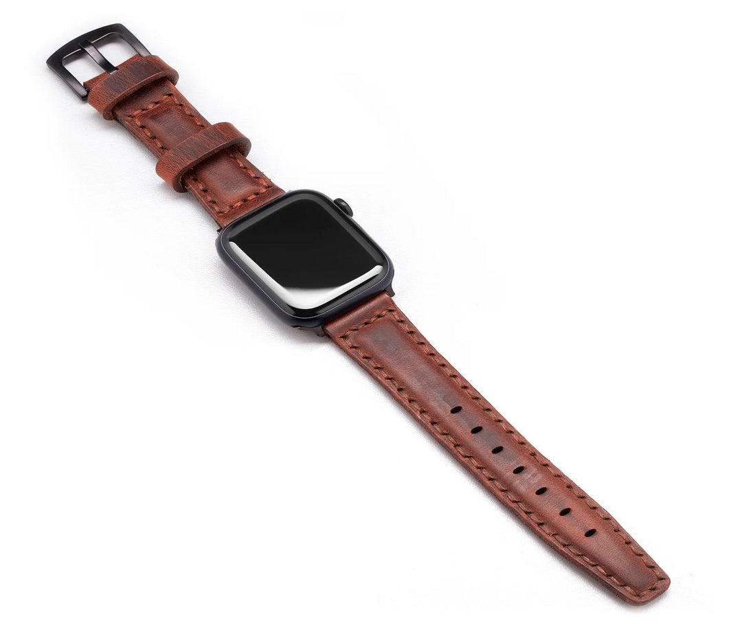 Smartwatch with a brown leather strap and black square face.