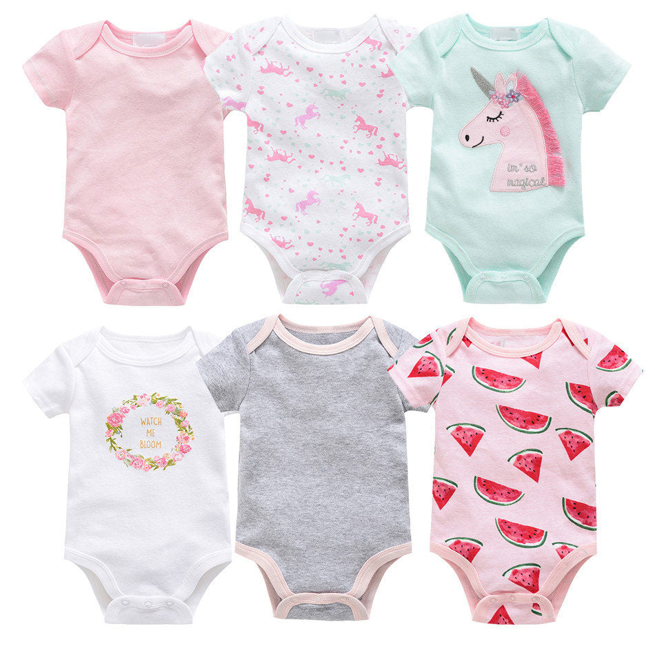 Six sets of newborn clothes