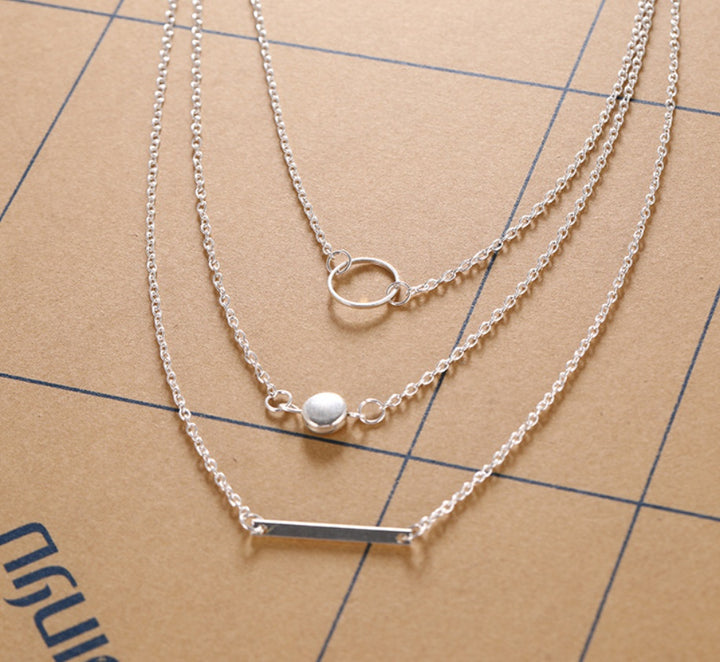 Aperture metal rod necklace