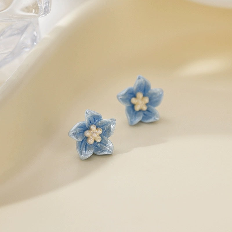 The Blue Flower Stud Earrings Are Delicate And Small