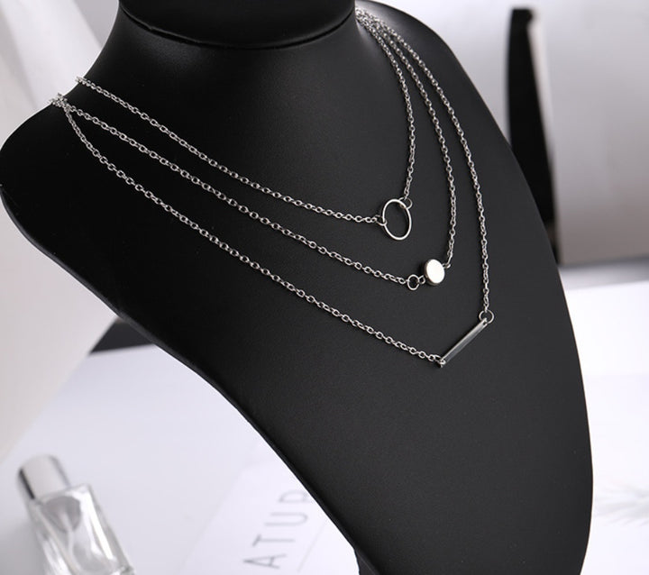 Aperture metal rod necklace