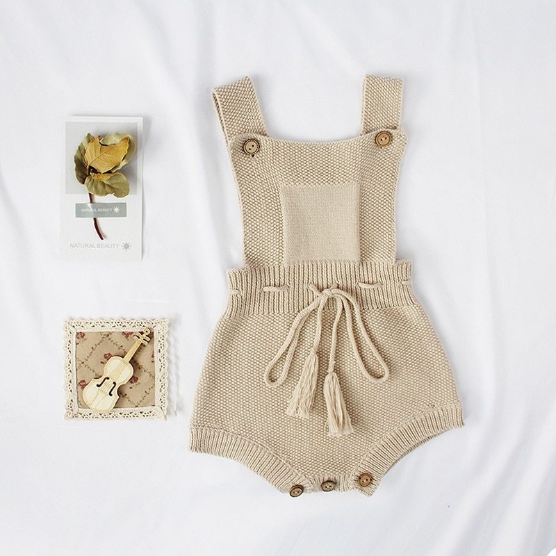 Knitted woolen jumpsuit for babies and toddlers