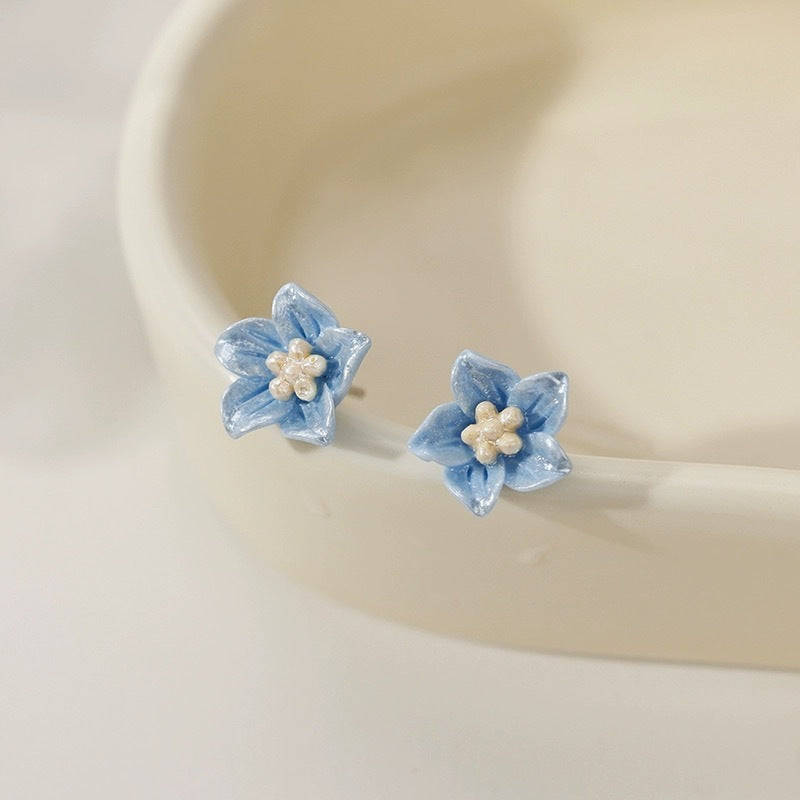 The Blue Flower Stud Earrings Are Delicate And Small