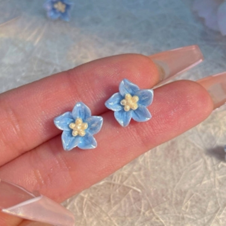 The Blue Flower Stud Earrings Are Delicate And Small