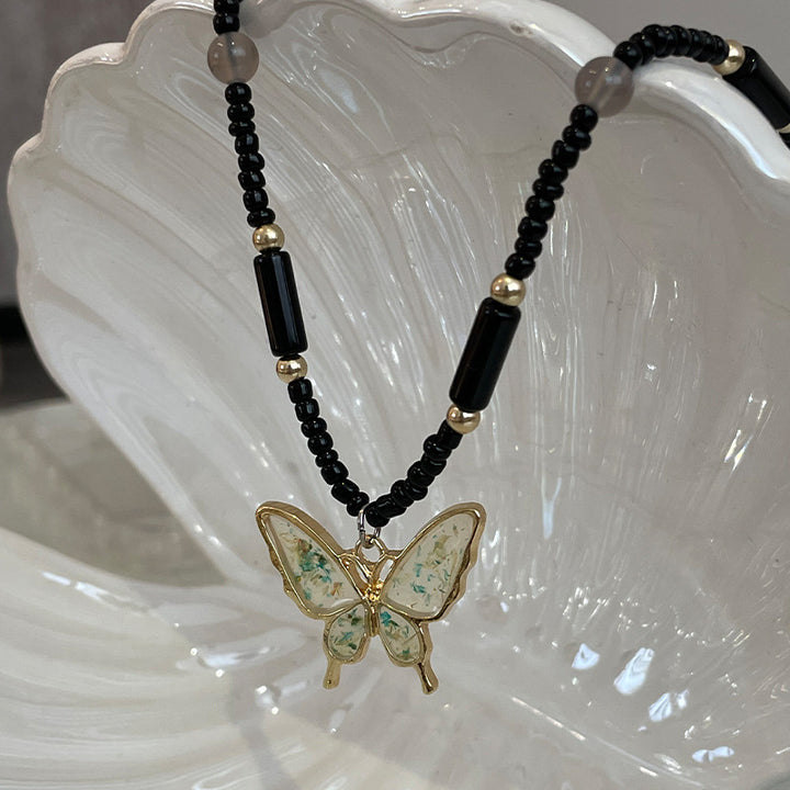 Black Beaded Butterfly Pendant Necklace