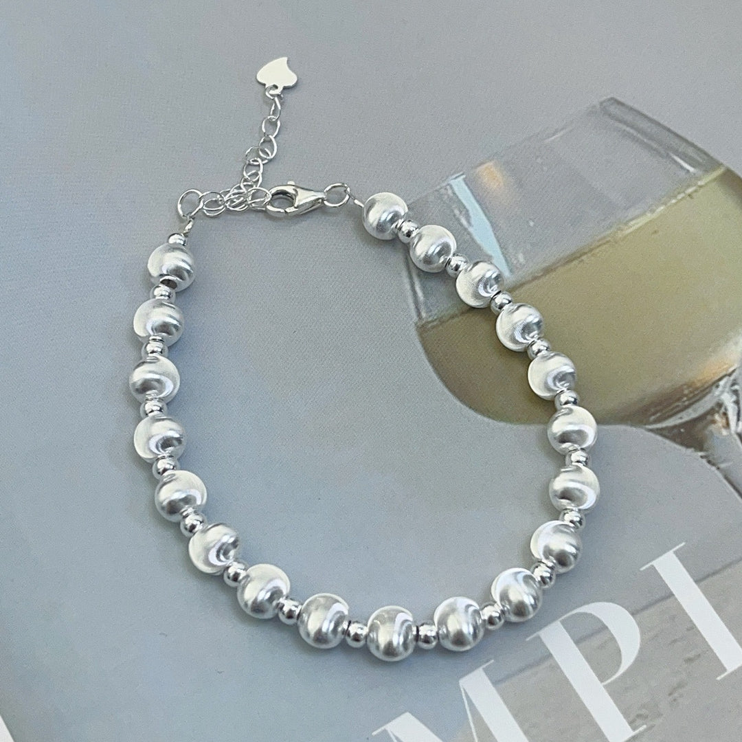 Women's Sterling Silver Laser Cat's Eye Bead Bracelet