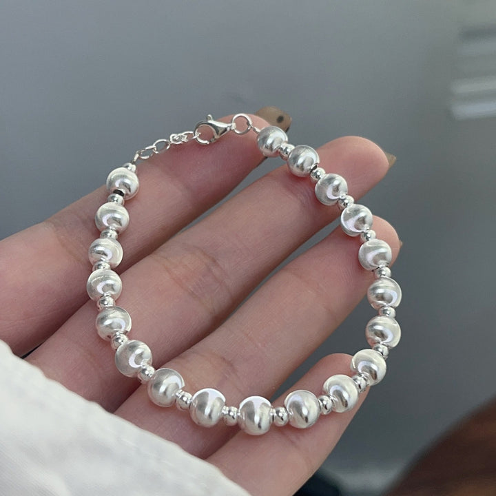 Women's Sterling Silver Laser Cat's Eye Bead Bracelet