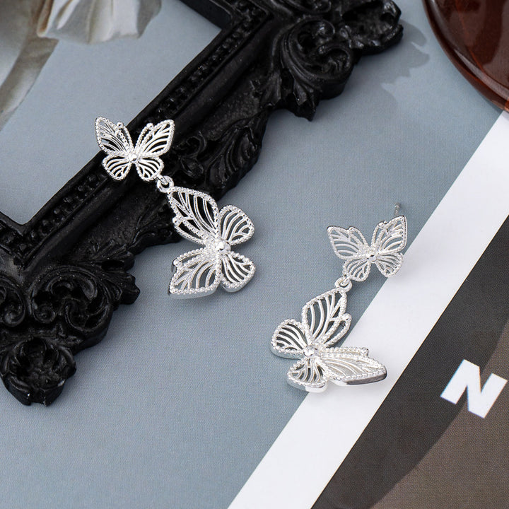 Silver Needle Butterfly Hollow Ear Stud Retro